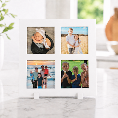 White photo frame with multiple family photos on a marble surface