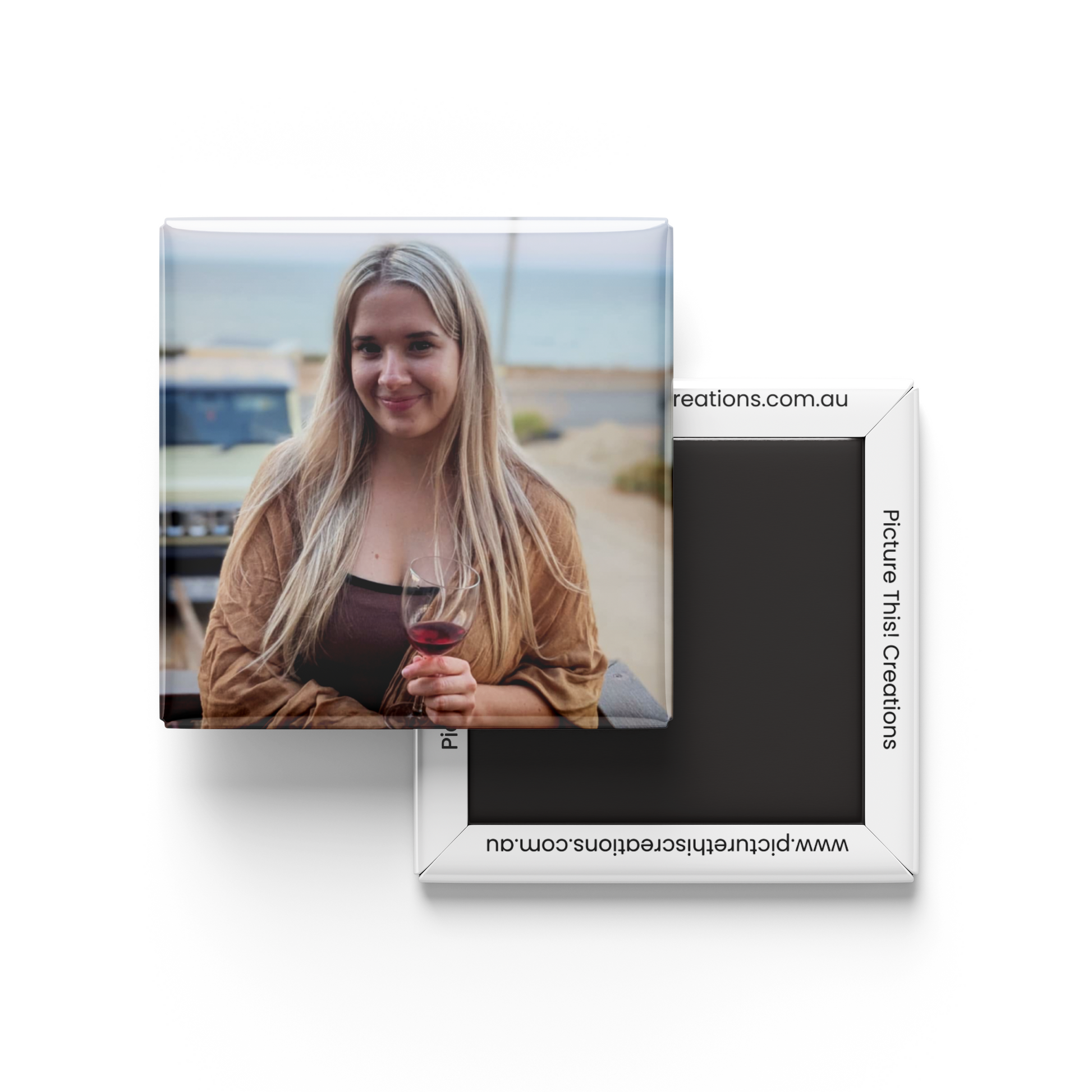 Rectangular photo frame with a woman holding a glass of wine on a beach, branded 'The Picture'.
