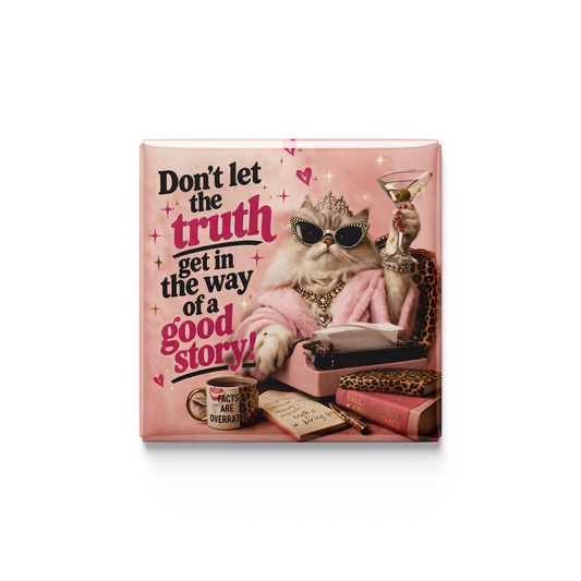 Decorative box with a cat at a typewriter and text 'Don't let the truth get in the way of a good story' on a pink background.